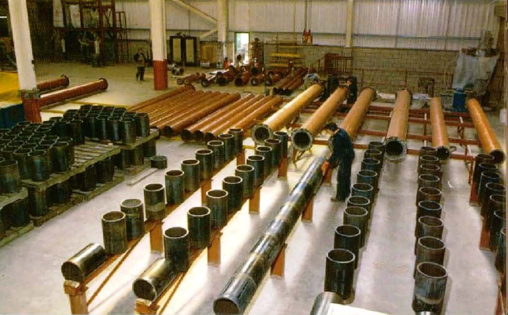 Lining steel pipe with cast basalt liners